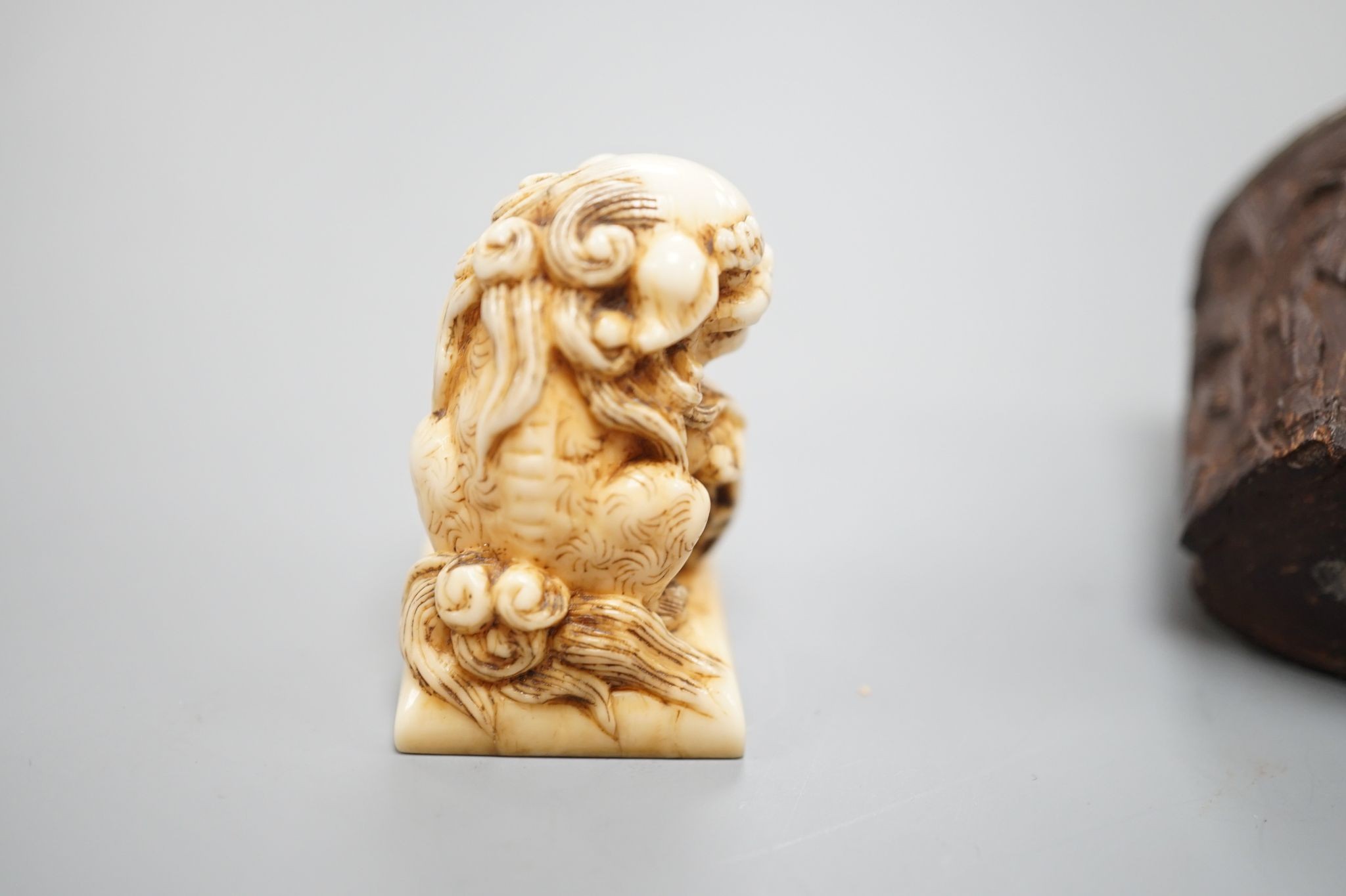 A Japanese ivory model of a banana, Meiji period 12cm